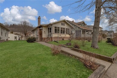 Charming front screened porch.