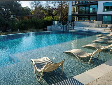 Community pool with a patio area