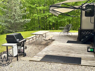 Extensive patio...grill, picnic table & patio furniture included