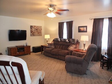 Spacious family room with access to covered porch.