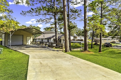 Concrete Drive to Garage and Carport