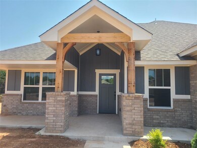 Property entrance with covered porch
