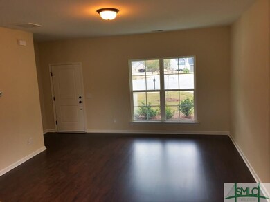 Family room with coat closet just off entry.