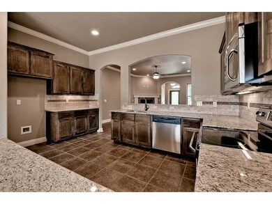 Exterior Front. Kitchen with Stainless Appliances