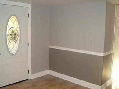 View. Close-up of foyer shows the 18