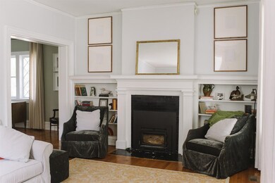 Living room with built-ins and working w