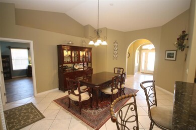 to your left. Dining room w/lighted plant ledge.