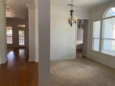 Unfurnished dining area with a chandelier, a healt