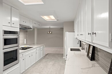 Recent oven and microwave. Tons of cabinets and ha