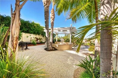 Step through the gate into the gorgeous yard with 
