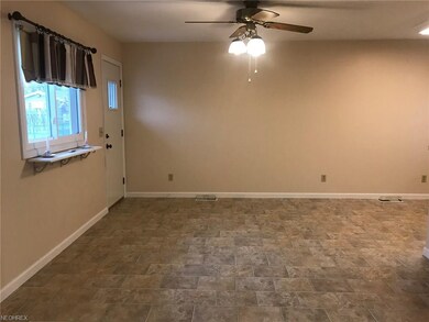 Spacious eating area with door leading to newer pa