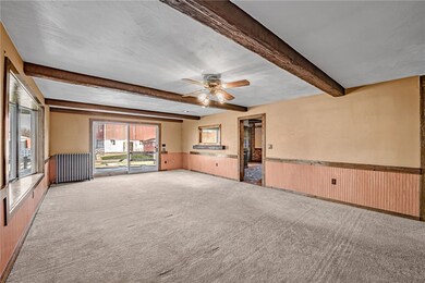 Family room with patio doors to wrap around deck