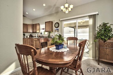 The dining room sits just off the kitchen, making 