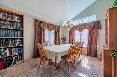 Formal dining room with plenty of room for a nice dinner with your family.  The natural light and tall ceilings provide extra beauty to this space.