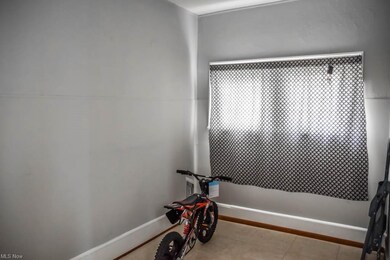 Bonus room off of the kitchen with outside access.