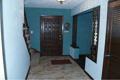 Other. Wide entry w/tile floor.  Wider staircase t