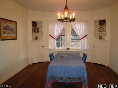 Formal dining room with wood floors in the 1st flo