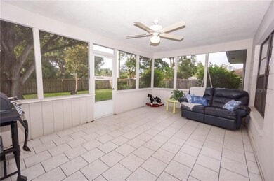 Huge covered, screened & tiled lanai overlooking m