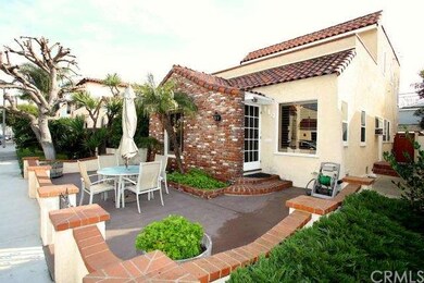 Front door and view of front patio from other dire
