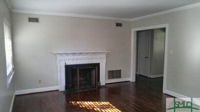 Refinished Hardwoods and Fresh Paint in the Living