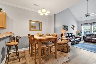 Dining room with light wood-type flooring, ceiling