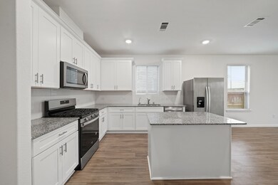 This beautifully designed kitchen features stunnin