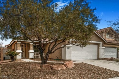 View of front of house featuring concrete driveway
