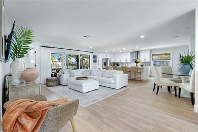Living room featuring recessed lighting, light woo