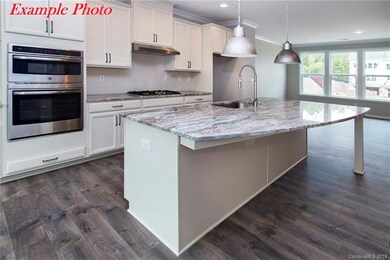 Large arched entertainment island with gorgeous qu