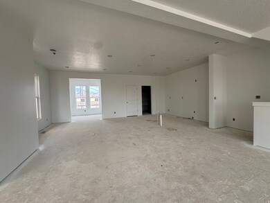 Empty room featuring a textured ceiling