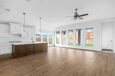 Kitchen featuring a sink, healthy amount of natur