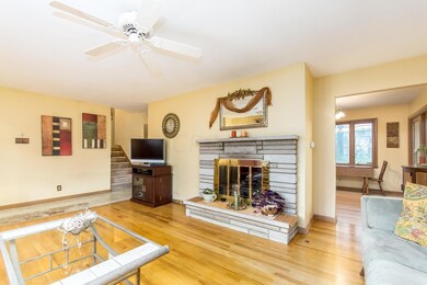 Stone front gas log fireplace