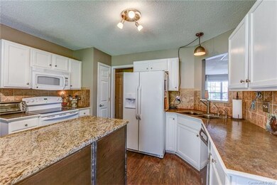 Island provides plenty of workspace and can be mov
