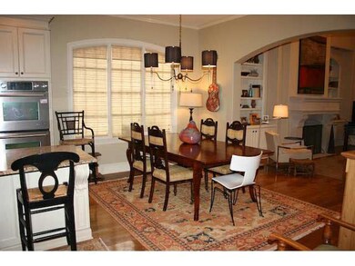 breakfast rm with hearth room in back ground with 