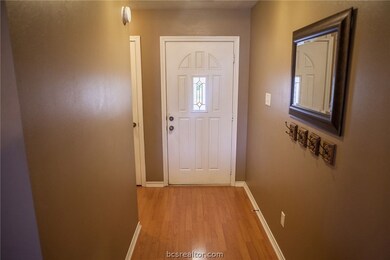 entry hall inside front door.  view with back to Living Room