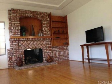 Handsome brick fireplace in living room - architec