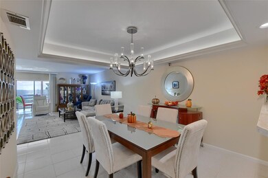 Formal dining area with coffered celing! VIRTUALLY