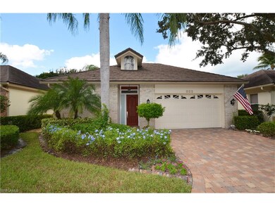 Lush Landscaping and Brick pavered drive welcomes 