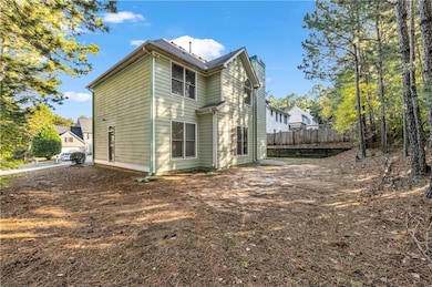 View of property exterior with a chimney