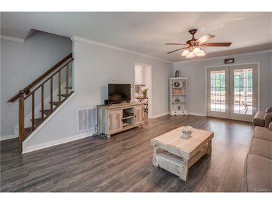 Double doors from living room lead out to huge dec
