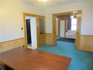 Wainscotting and built-ins in this large Dining Ro