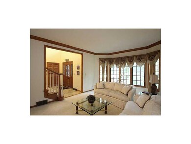 Living Room. Large windows with a view of the fron