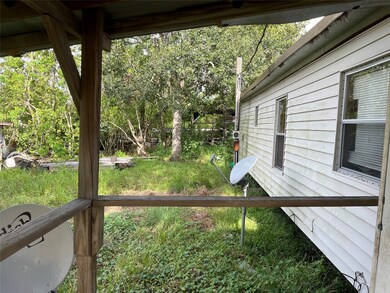 Looking toward the back yard/fence from the front