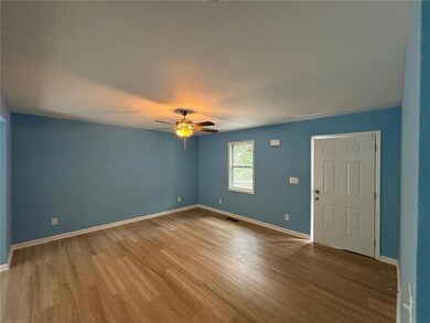 Unfurnished room with wood-type flooring and ceili