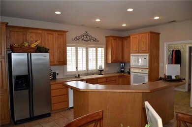 Spacious kitchen with loads of cabinets and dining