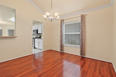The dining room is just off the kitchen which is p