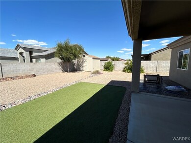 View of yard featuring a patio area and a shed