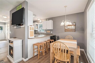 With the dining table and the kitchen bar, there is enough room to host well.