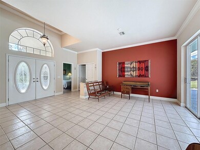 Double doors lead into the Formal Living Room