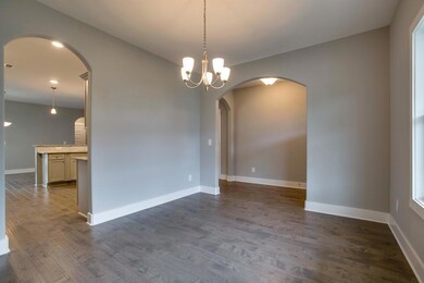 The dining/flex room has access to the front foyer and the kitchen